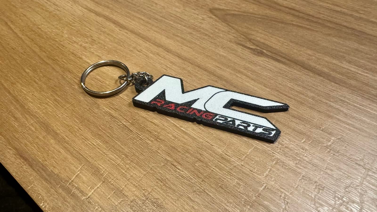 Tanda de llaveros personalizados con el logo de MC Racing